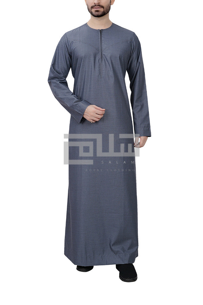 An Eye-catching Men's Grey Omani-Style Thobe made from 100% polyester. Crafted with precise stitch lines on premium fabric makes this piece favorite for the trendsetter. The lightweight and flowy fabric makes this the ideal Thobe for the summer. 